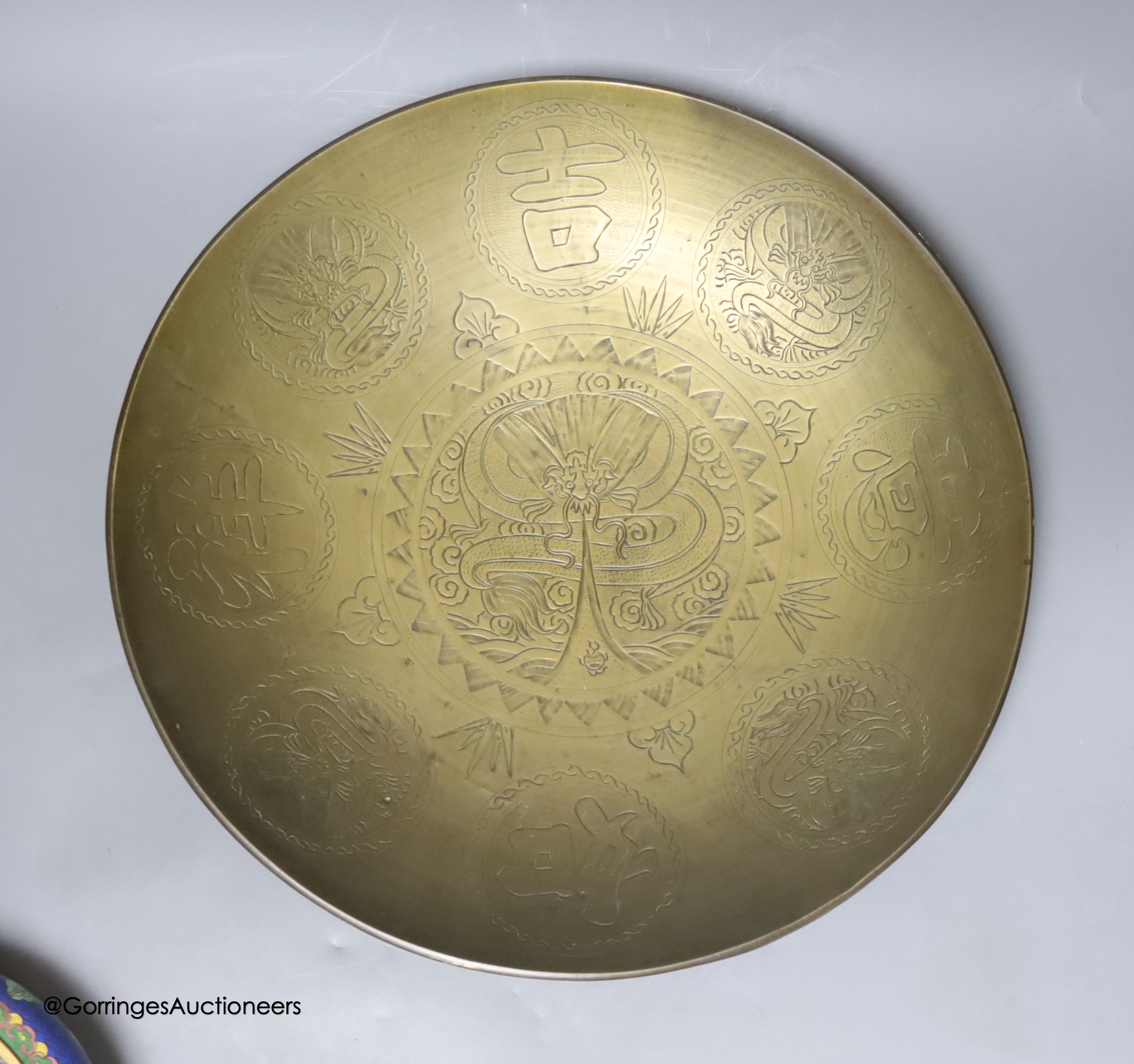 A large Chinese brass dish, diameter 42cm, a similar bowl, cloisonne enamel and Canton enamel wares and an agate snuff bottle